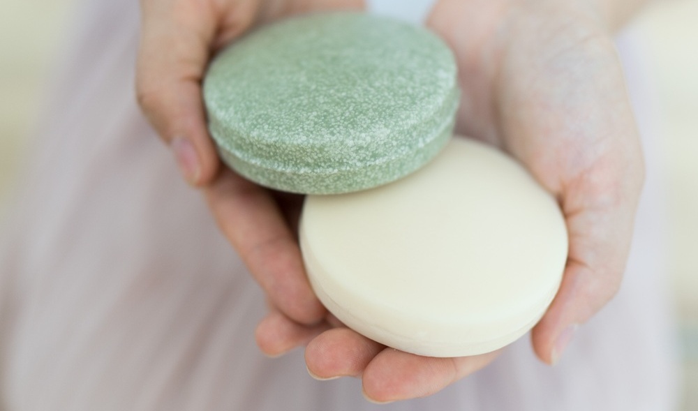 Tuhý šampon a balzám na vlasy Oliva